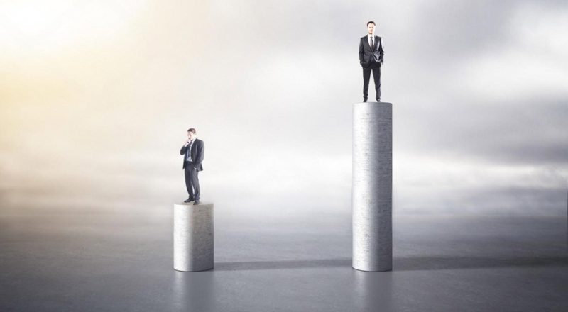 Illustration of two professionals on pillars of different heights representing career growth and leadership readiness